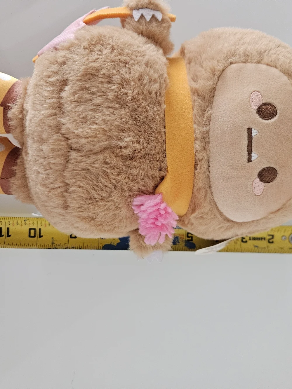 Plush Brown Monster Stuffed Animal with Pink & Yellow Accents